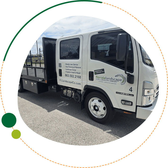 Florida Landscape Co. service truck parked in Davenport, FL, featuring company logo and contact information for professional landscaping and irrigation repair services.