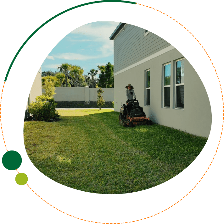Professional landscaper providing regular lawn maintenance specific to central florida homes
